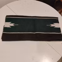 Svartgrön sadelfilt