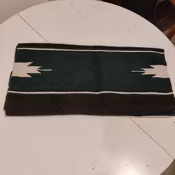 Svartgrön sadelfilt