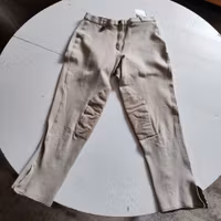 Beige knäskodda ridbyxor strl 42