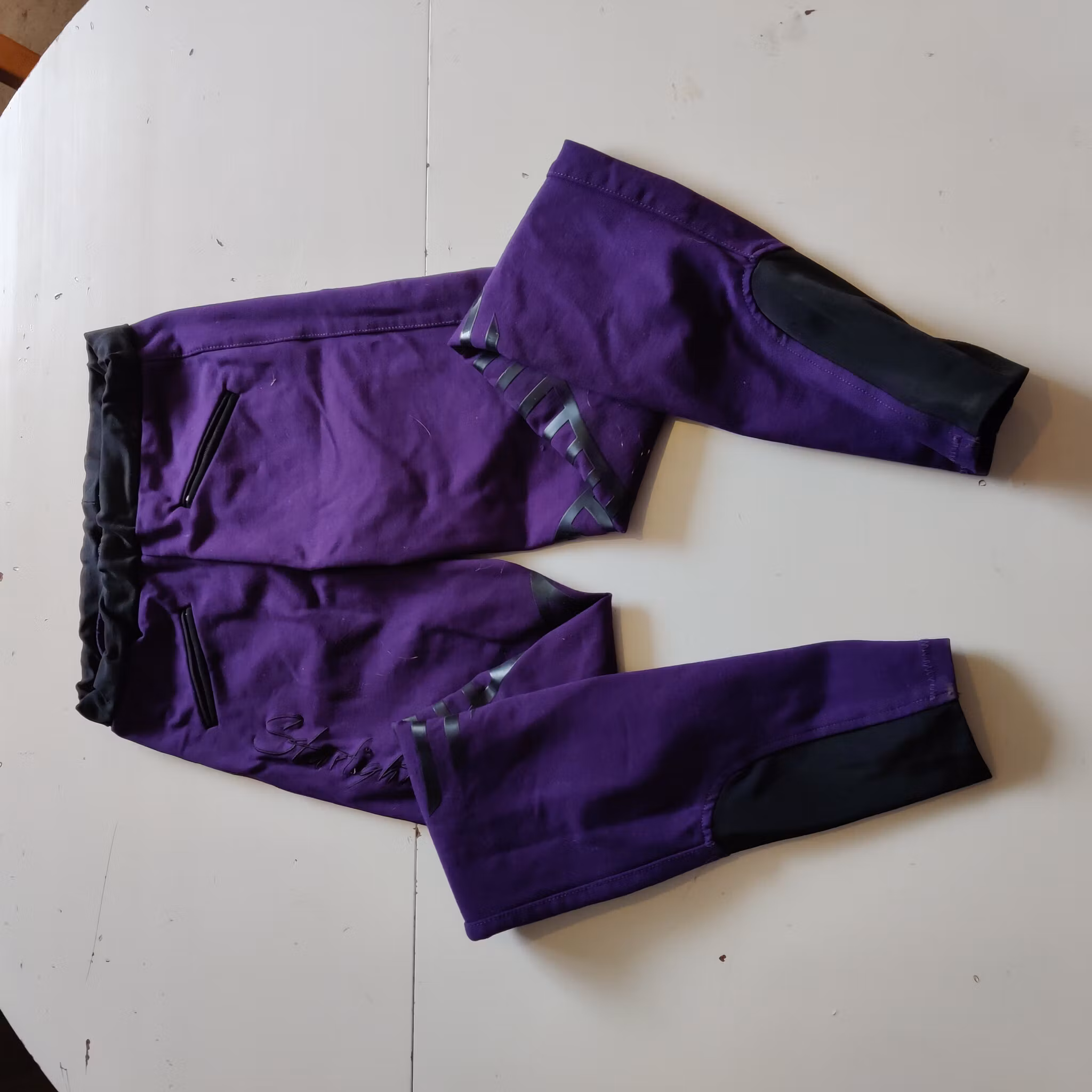 Lila ridtights med knägrip strl 32 Starlight