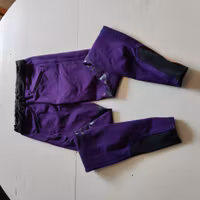 Lila ridtights med knägrip strl 32 Starlight