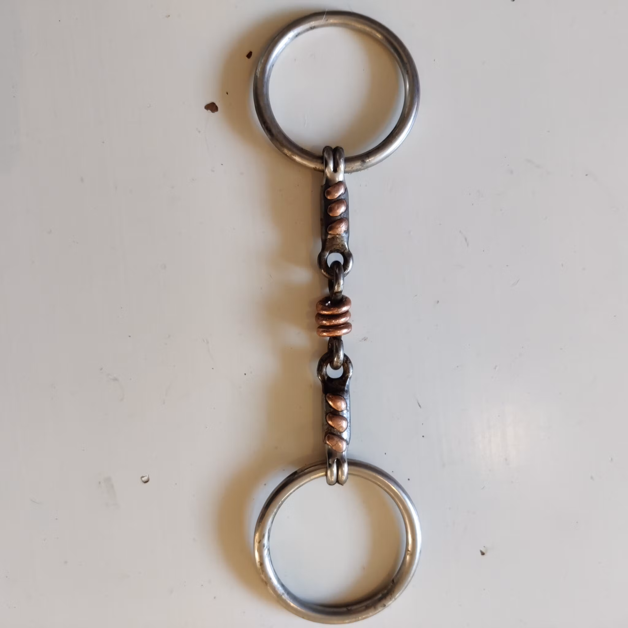 Tredelat bett med kopparrullar 13.5 cm