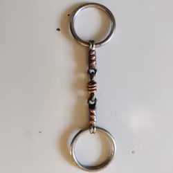 Tredelat bett med kopparrullar 13.5 cm