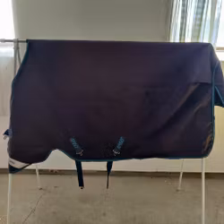 Blått regntäcke 130 cm 100 g Amigo Bravo 12