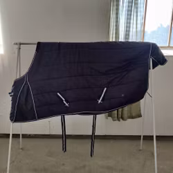 Blått stalltäcke 115 cm ca 150 g Hansbo