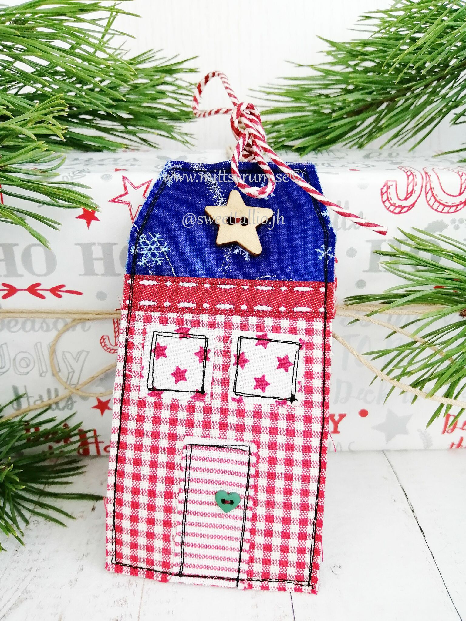 Julklapps Tagg Hus