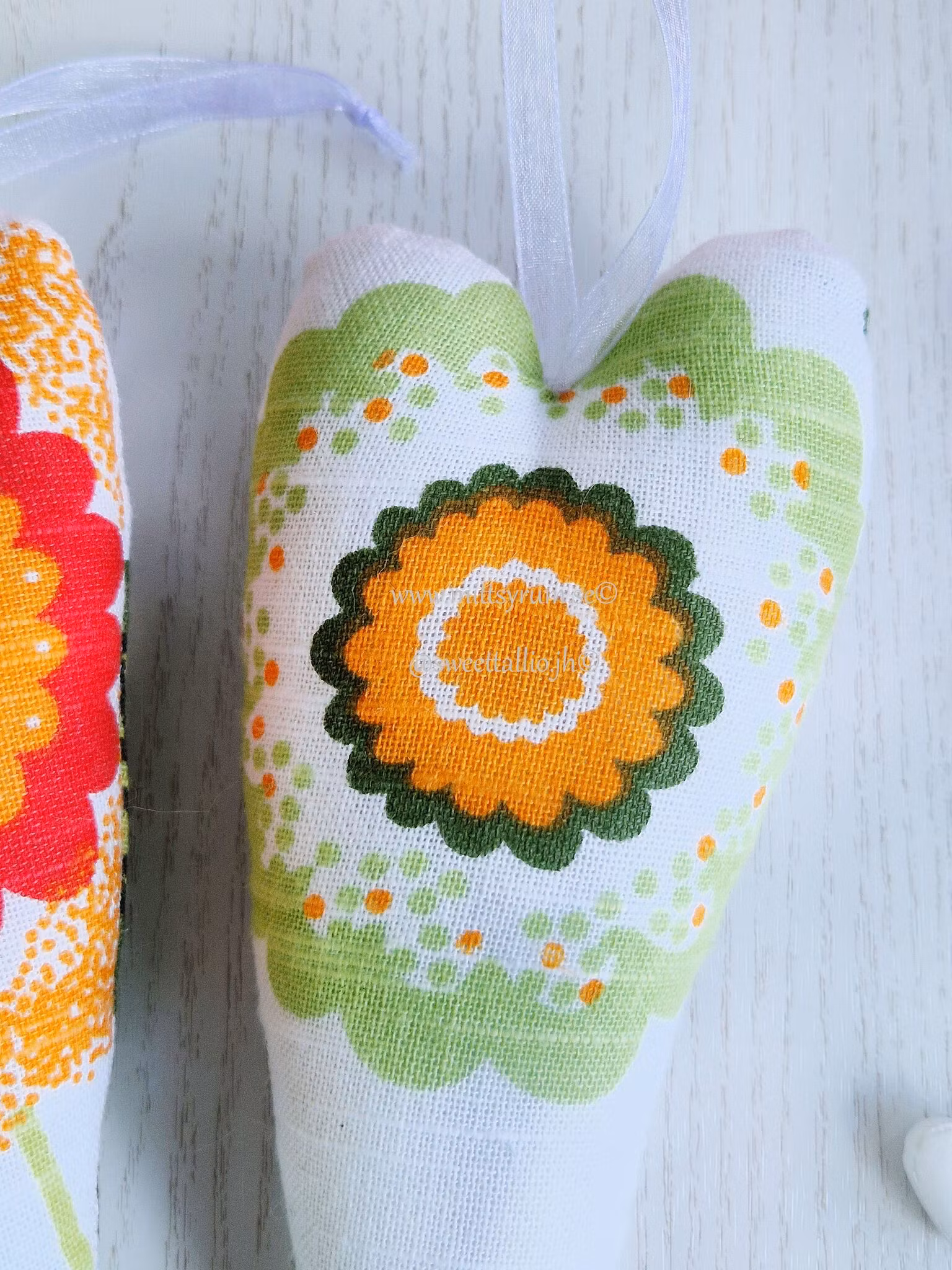 Tyghjärta smalt Orange blom 2-pack