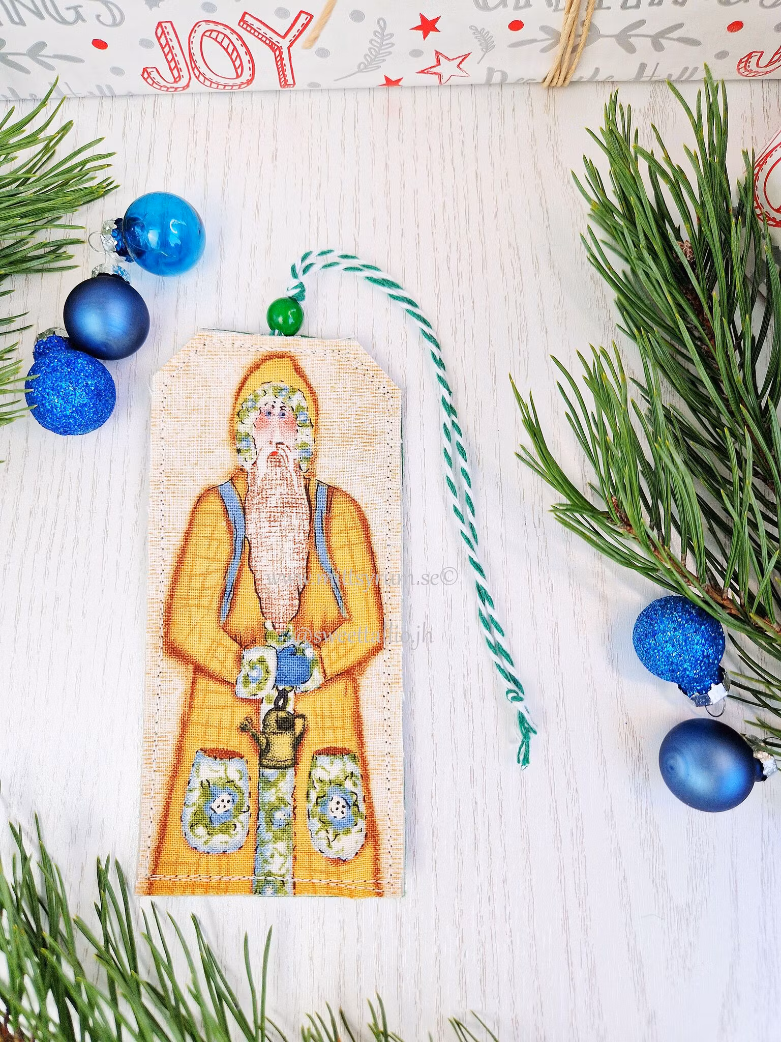 Julklapps tag Tomte Vattenkanna