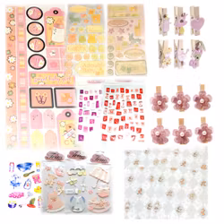 Mix med ca 12 paket dekorationer och 4 ark papper  15 x 15 cm