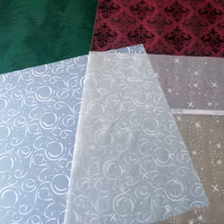 Scrapbookingspapper - ca 20 - 30 cm - ca 10 st - julmotiv
