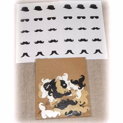 Mustasch i papper och klistermärken