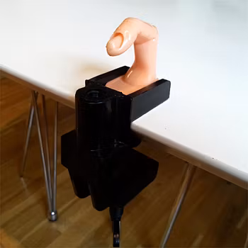 Hållare till övningsfinger