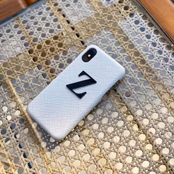 White Saffiano met metalen letter