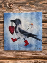 Stolt kråka med hjärtat i näbben.