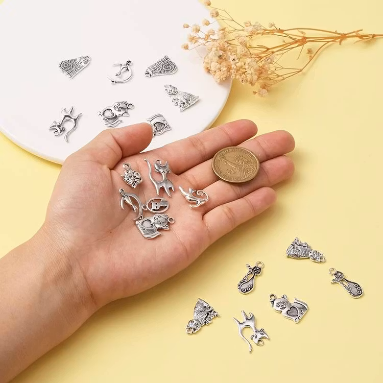 Mix av silver-berlocker - 30st