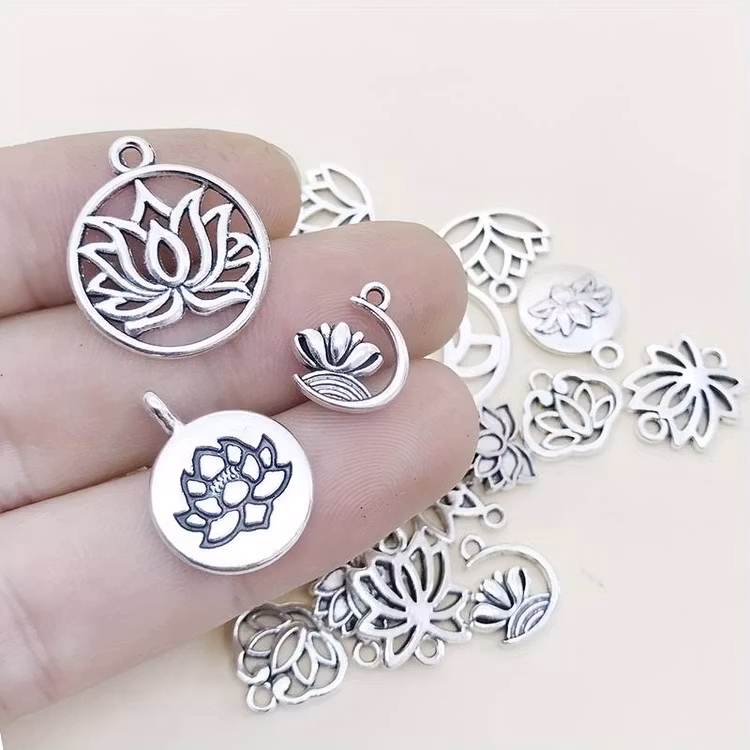 Mix av silver-berlocker - 30st