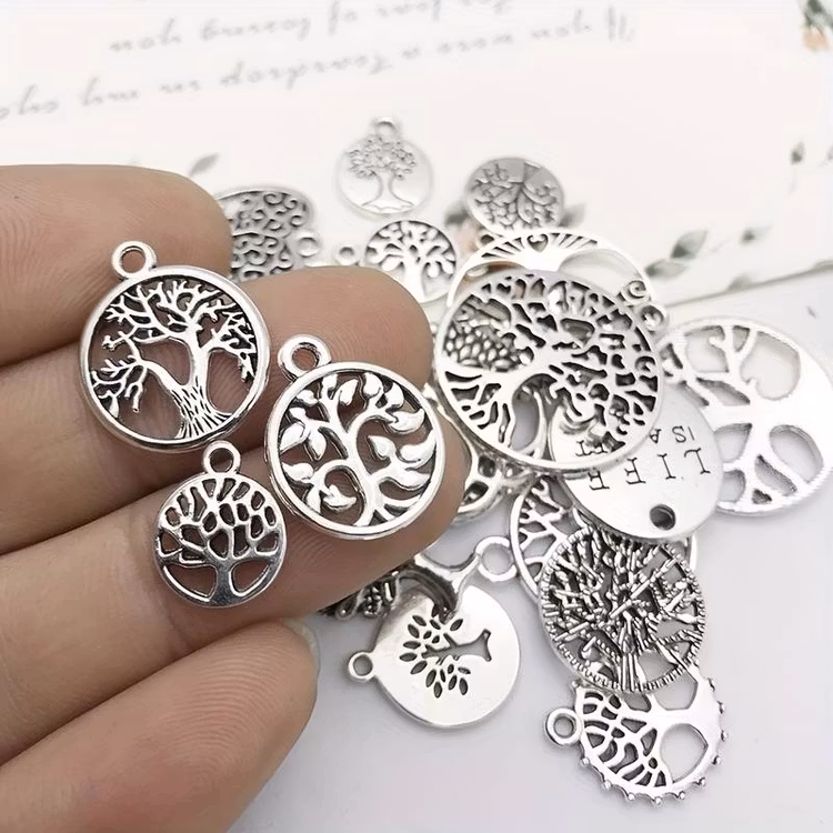 Mix av silver-berlocker - 30st
