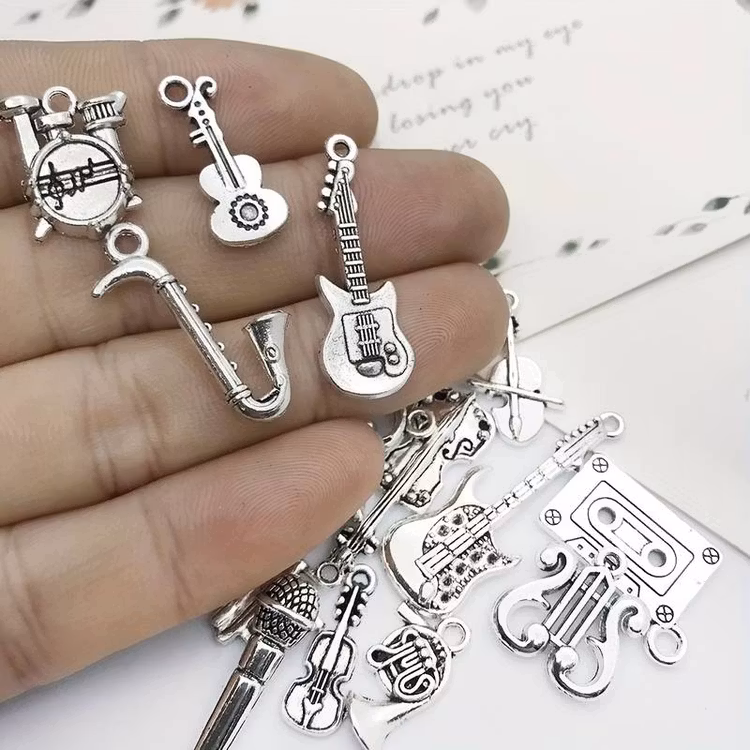 Mix av silver-berlocker - 30st