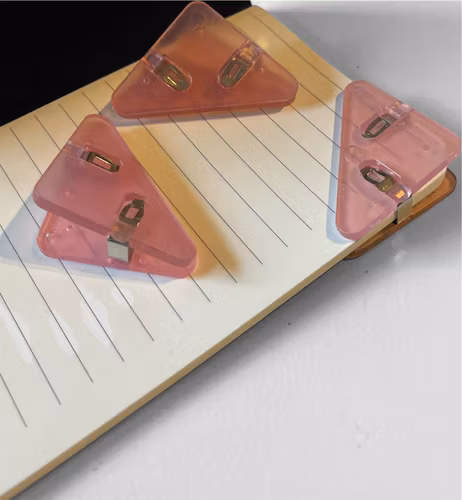 Hörnklämma - rosa transparent