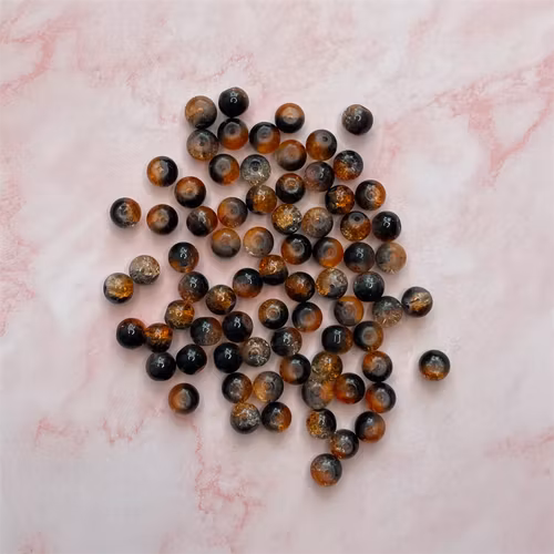 Glaspärla, orange/svart, 8mm - 50 st