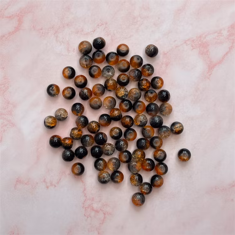 Glaspärla, orange/svart, 8mm - 50 st