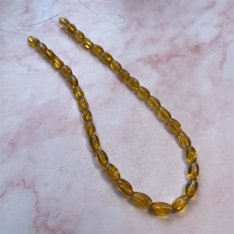 Ehawa - Glas, tvistad, klar guld, 6x9mm
