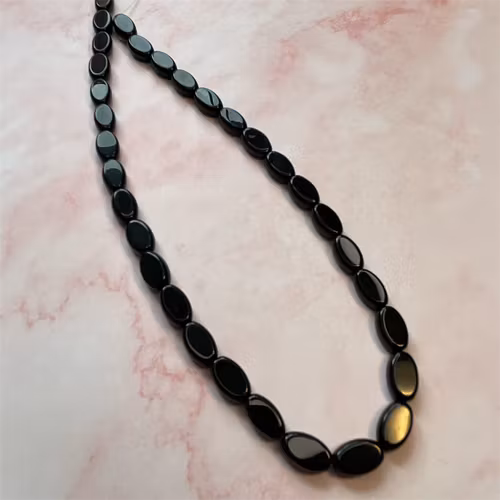 Ehawa - Glas, oval, svart, 6x9mm
