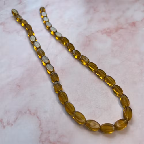 Ehawa - Glas, oval, klar guld, 6x9mm