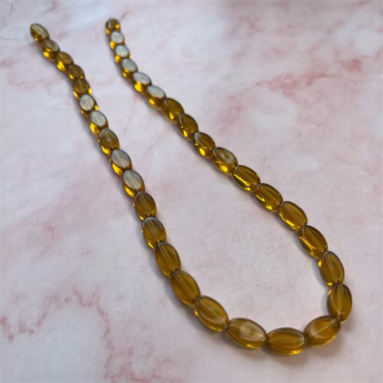 Ehawa - Glas, oval, klar guld, 6x9mm