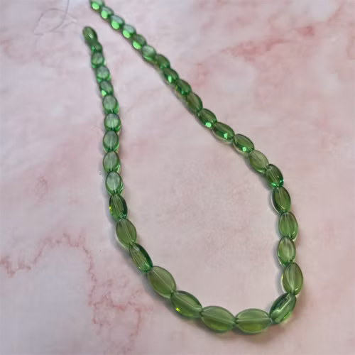 Ehawa - Glas, oval, klar grön, 6x9mm