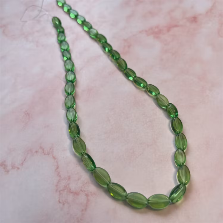 Ehawa - Glas, oval, klar grön, 6x9mm