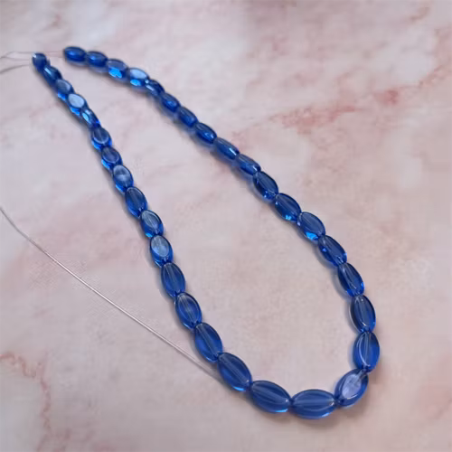Ehawa - Glas, oval, klar mörkblå, 6x9mm