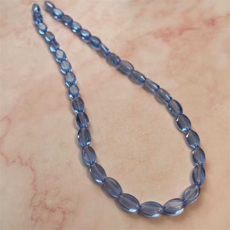 Ehawa - Glas, oval, klar blå, 6x9mm