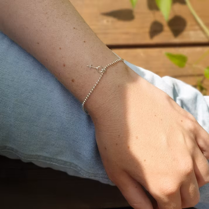 Kvinnokraft Silverarmband/fotlänk