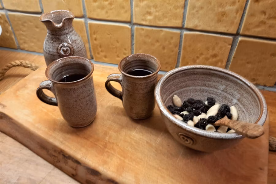 Lerkärlet Krukmakeri och dess keramikcta image