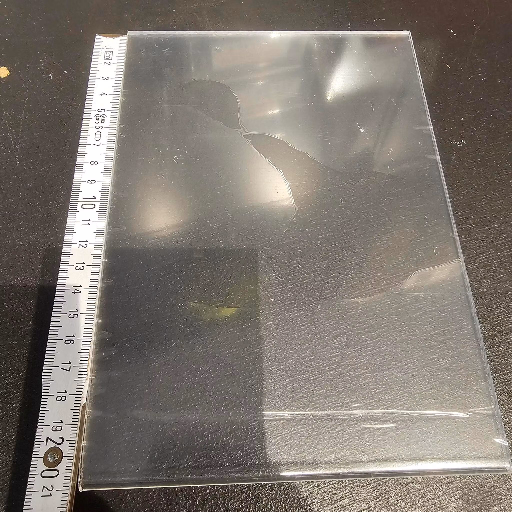 Display i akryl i original innpakning (bobleplast) 20x14cm / A5