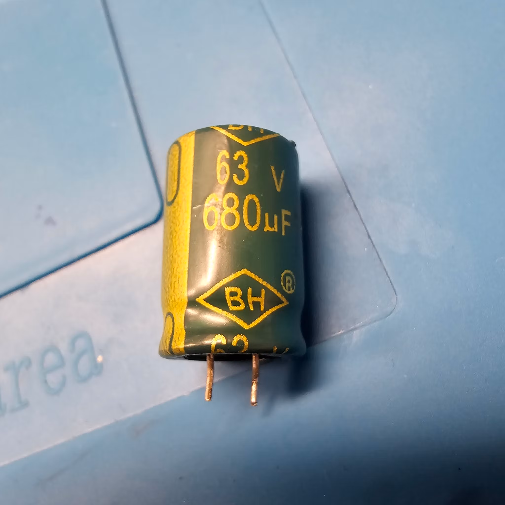 680uF 63V 19mm x 12mm ( Pulled from device ) 105°
