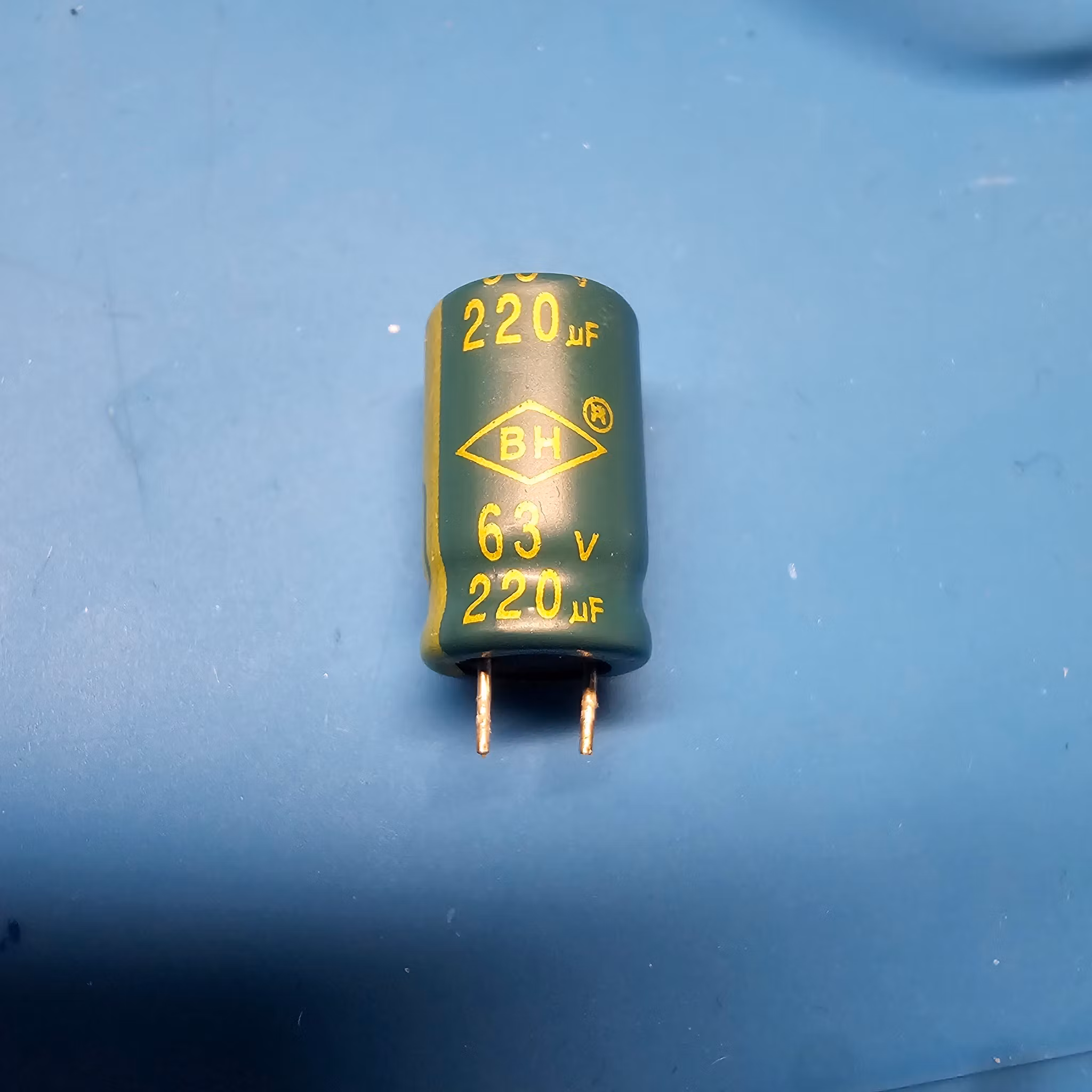 220uF 63V 16mm x 9mm ( Pulled from device ) 105°