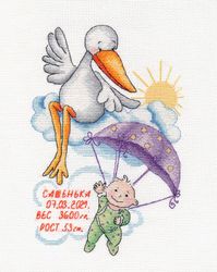 Broderikit. Födelsetavla. Pojke och stork