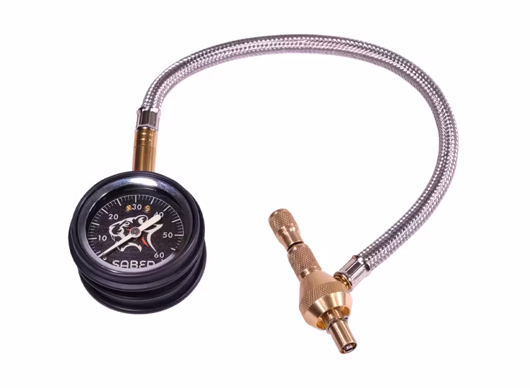 Saber däcktrycksklocka för tömning