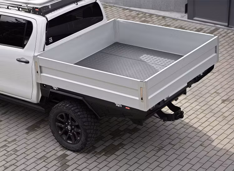 Transportflak med fällbara lämmar Toyota Hilux dubbelhytt 2015+