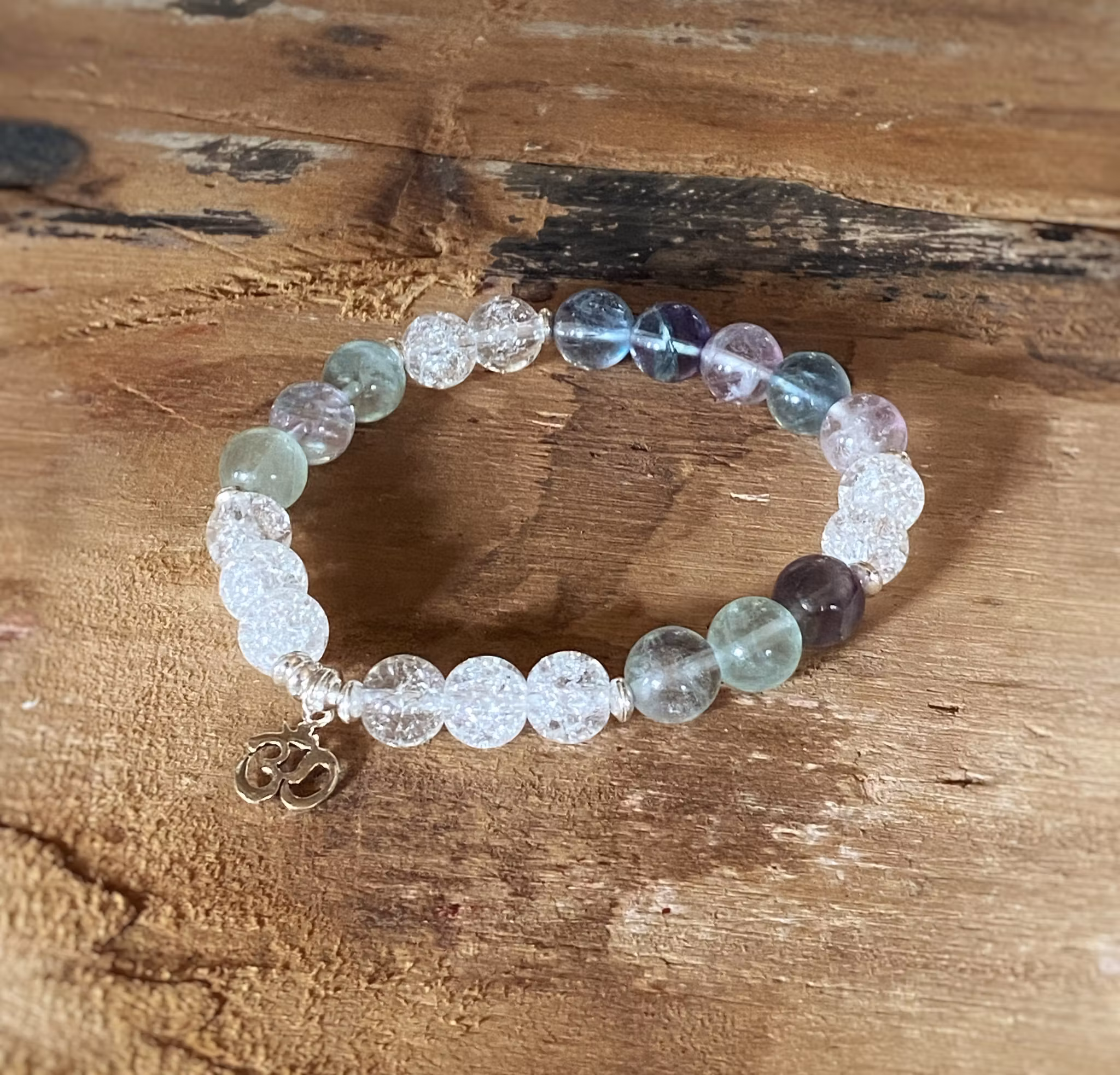 Armband bergkristall, fluorit & Aum i silver