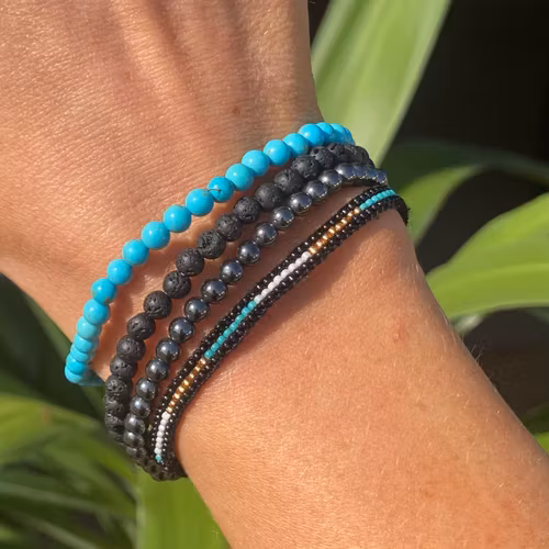 Armband miyuki pärlor turkos/svart/guld/vit