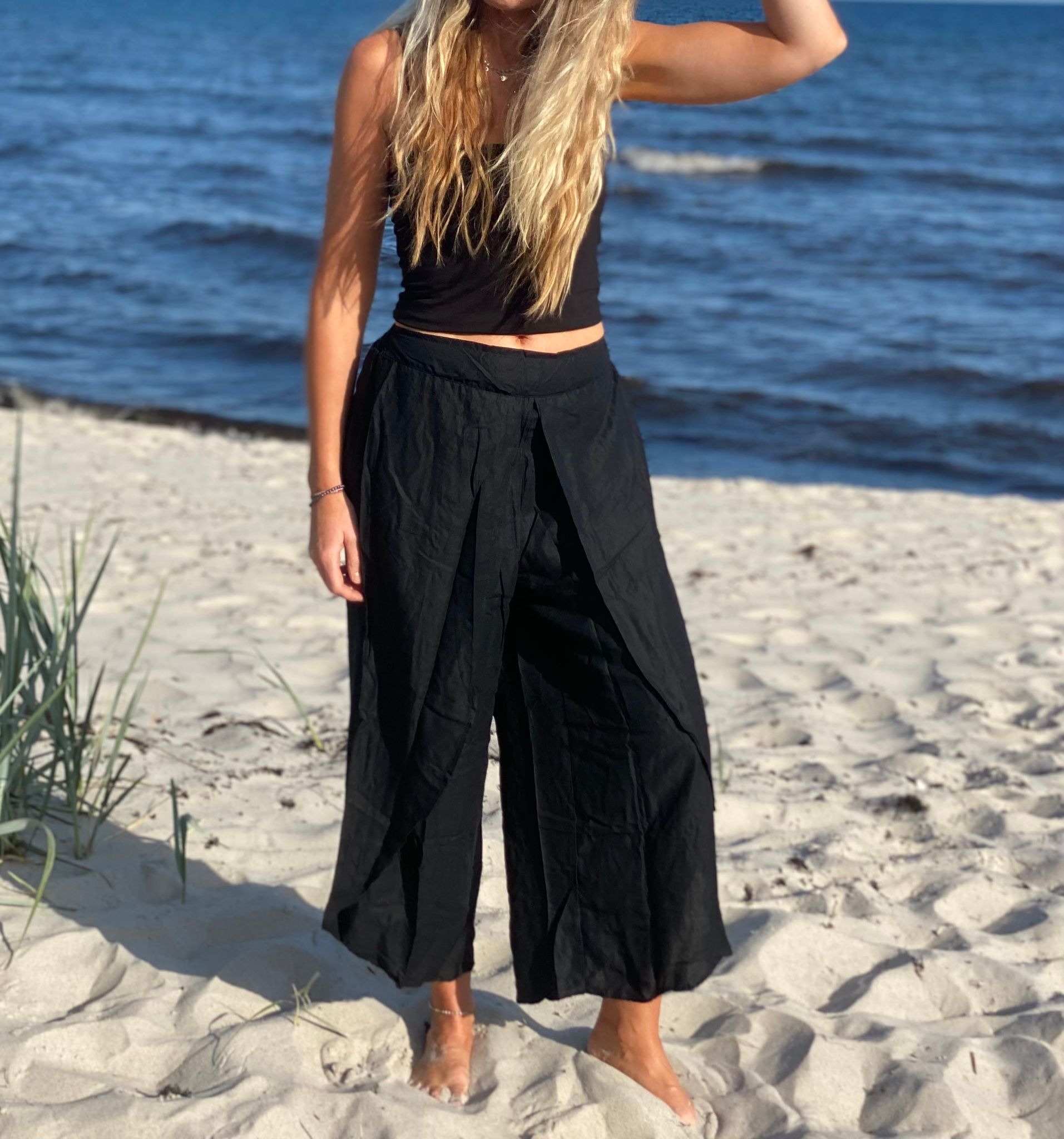 Vida byxor med slits svart