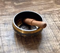 S sjungande skål med Aum