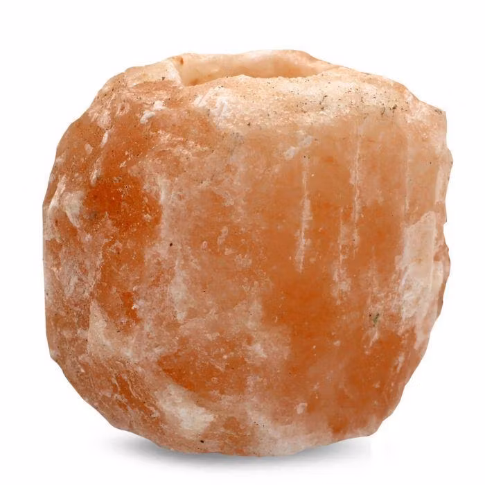 Orange ljuslykta i saltsten från Himalaya