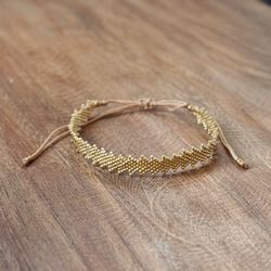 Armband phyton guld