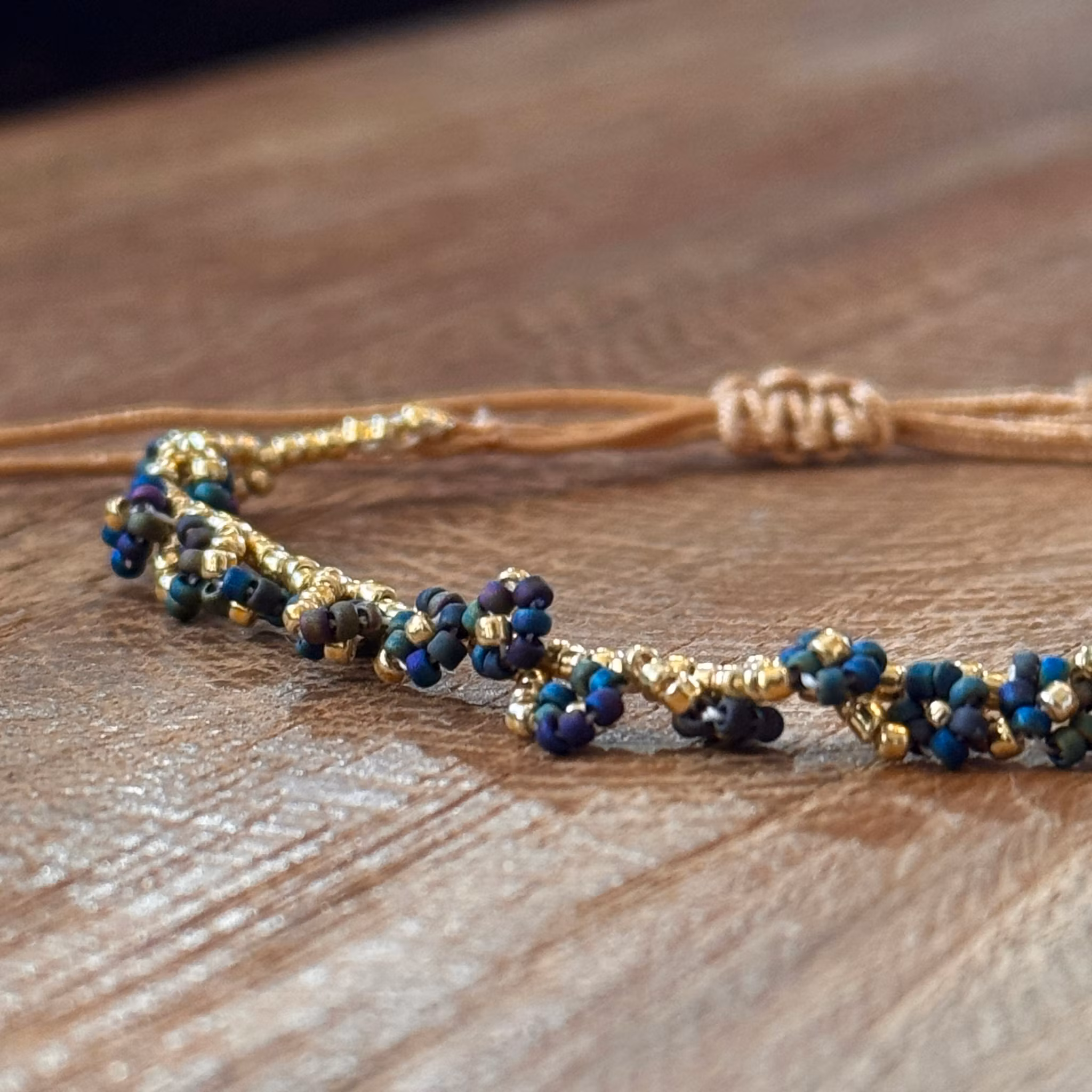 Armband blomma guld/havsblå