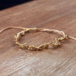 Armband blomma guld/ljusbrun