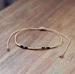 Armband guld/svart